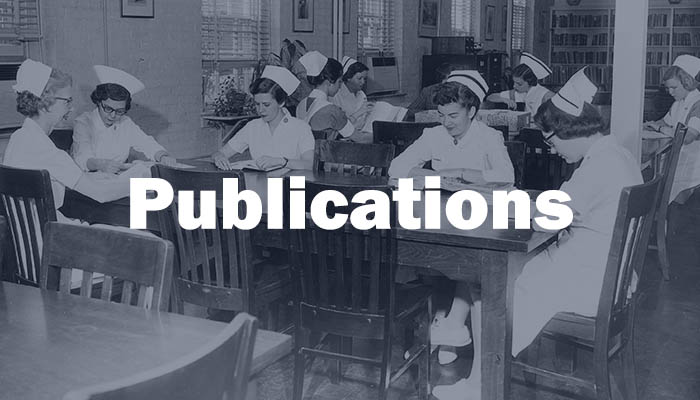 A historic image of nurses studying in a library