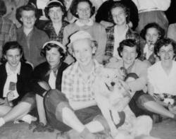 Instructor Zula Mae Baber and students pose at a class picnic, c.1950.	Peggy Williams Morris (DIPLO 1951) donation, Eleanor Crowder Bjoring Center for Nursing Historical Inquiry, University of Virginia School of Nursing.
