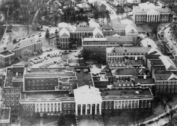 By the 1950s the hospital had grown into a sprawling complex offering multiple health services.	Courtesy of Historical Collections & Services, Claude Moore Health Sciences Library, University of Virginia.